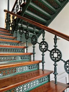 Iron And Wood Railing, Cool Staircases, Staircase Spindle Ideas, Round Staircase Design, Curving Staircase, Cool Stairs, Art Deco Staircase, Hotel Stairs, Art Deco Stairs