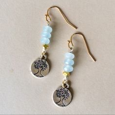 This Is New Handcrafted Earrings Silver Hammered Tree Of Life Light Blue Tone Aquamarine Gold Plated Beads Accent Gold Plated Ear Wire Hooks Approx 1.8” Total With Hooks, 10mm W Handmade In Us Please Review My Other Jewelry On Sale. Bundle Up And Save Even More. Fast Shipping Beaded Boho Earrings, Blue Metal Beaded Earrings For Gift, Nickel-free Blue Beaded Earrings As Gift, Nickel-free Blue Beaded Earrings For Gifts, Light Blue Metal Earrings As A Gift, Light Blue Metal Earrings For Gift, Nickel-free Blue Beaded Sterling Silver Earrings, Blue Metal Earrings For Everyday Wear, Handmade Blue Jewelry For Everyday Wear