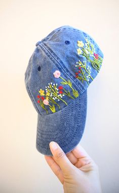 Hand embroidered vintage style hat, unstructured headband, with preformed visor, ventilation grommets. Adjustable with brass effect buckle. Color: Vintage Denim Design: Hand Embroidered flowers. Cap size (head circumference): 55-67cm; Fabric: 100% brushed washed cotton. Denim Snapback Baseball Cap For Spring, Denim Baseball Cap For Summer, Retro Snapback Hat With Curved Bill For Spring, Summer Denim Snapback Baseball Cap, Retro Curved Brim Baseball Cap For Spring, Retro Spring Baseball Cap With Curved Brim, Retro Curved Bill Hats For Spring, Vintage Curved Bill Snapback Hat For Spring, Embroidered Summer Trucker Hat With Curved Bill