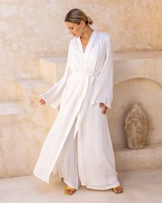 Our Maxi Kaftan wraps you in effortless grace, offering a fit that feels natural and relaxed. With its flowing shape and timeless design, it brings a perfect balance of comfort and elegance to your everyday moments. How to Choose Your Size Slim Fit • Choose a size with a chest measurement 11-15 cm (4-6 inch) larger than your own chest circumference. *This fit is not designed for wrapping the kaftan Normal Fit • Choose a size with a chest measurement 16-20 cm (6-8 inch) larger than your own chest Maxi Kaftan, Kaftan Maxi Dress, Live Shop, Divine Light, Short Kimono, Everyday Moments, Kaftan Dress, Summer Look, Top Collection