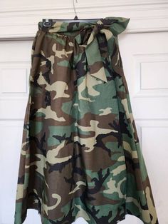 "Unique camoflauge skirt 2\" wide waistband Button closure Side pockets Back waistband has elastic Dress up or down.  Wear with denim jacket and combat boots or sneakers  or dress up with fitted bodysuit or white button up and high heels.  The options are endless.  Date night/girls night/brunch/shopping attire/comfy skirt Maxi Skirt depending upon your height.  Full front coverage under overlay Measurements lying flat: Size Small Waist:  14\" plus 2\" stretch ability Hips:  Free Length:  36\" lo Street Style Skirt, Influencer Style, Comfy Skirt, Upcycle Tshirt, Reversible Scarf, Fashion Influencer, Skirt Maxi, Urban Street Style, Skirt Midi