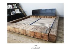 a bed frame made out of wood and metal