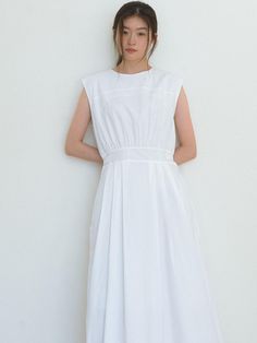 This is a feminine and minimal dress by Laminez that is made out of high quality and sturdy material. With distinctive mood of the design and comfortable wear, you can style it for your refined daily outfit.- Cool touch and sleeveless design- Flared silhouette below the waistline- Adjustable waistline- Modern and feminine mood Classic Sleeveless Midi Dress For Summer, White Sleeveless Dress With French Seams, Modern White Sleeveless Midi Dress, Classic Sleeveless Midi Dress With Pleated Waist, White Sleeveless Dress With Pleated Waist, Chic Sleeveless Midi Dress With French Seams, Minimalist Sleeveless Midi Dress For Spring, White Sleeveless Cotton Dress For Work, Minimalist Sleeveless Dresses For Workwear