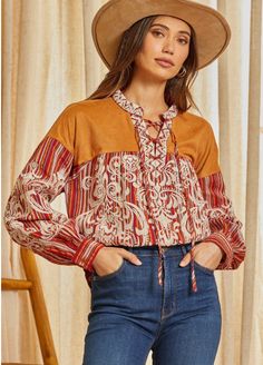 This beautiful striped pattern blouse features a suede panel with lace up detail. This top features gorgeous embroidery with long sleeves. One of a kind. Non sheer, woven. Brown Patchwork Long Sleeve Blouse, Long Sleeve Peasant Top With Boho Print For Fall, Long Sleeve Boho Print Peasant Top For Fall, Chic Fall Blouse With Patchwork Details, Fall Boho Print Long Sleeve Blouse, Long Sleeve Boho Print Blouse For Fall, Brown Long Sleeve Peasant Top For Fall, Brown Boho Print Blouse For Fall, Brown Boho Print Tops For Fall