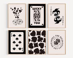 four playing cards with different designs on them