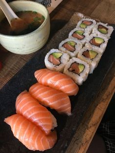 sushi and chopsticks on a wooden table