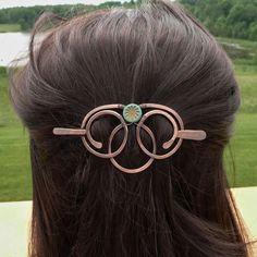 Hair Barrette Clip with Stick -handcrafted & unique -strong and sturdy - made of solid copper metal -wear right side up or upside down for different looks (see photos) -featuring beautiful turquoise glass bead with copper flower motif -wire wrapping detail -perfect for those with long flowing hair -free shipping  SIZE: 2.75 inches wide 1.75 inches tall. Stick/fork that goes through the main component is 4 inches long Flowing Hair, Turquoise Glass, Flower Motif, Copper Metal, Barrette Clip, Hair Pin, Free Hair, Hair Barrettes, Hair Accessories For Women