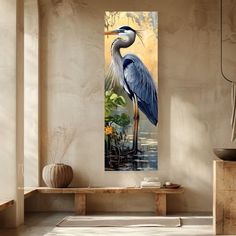 a painting of a blue heron on a wall in a room with a table and chair