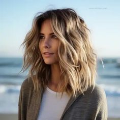 Soft Beach Waves with Subtle Ombre Medium Bob Haircut Shoulder Length Beach Waves, Mid Length Beach Hair, Textured Hairstyles Medium, Full Medium Length Hair, Think Medium Length Hair Styles, Mid Length Haircut For Oval Face, Medium Length Sandy Blonde Hair, Side Part Layered Hair Medium, Shorter In Back Longer In Front Hair