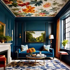 a living room with blue walls and paintings on the ceiling