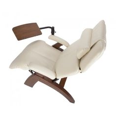 the reclining chair has a wooden base and white leather upholstered backrest