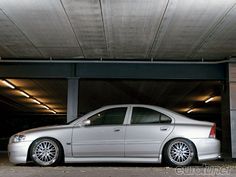 a silver car parked in a parking garage