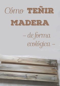 a wooden bench sitting on top of a white floor next to a sign that says como tenir madera de forma ecologica