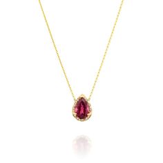 Eden Necklace - Pink Tourmaline The serene power of the enchanting Eden Ring is enhanced by a vibrant Tourmaline, emanating a delicate shimmer with a captivating aura. Materials Description:- 14k Gold.- 3 ct. Pear-shaped pink Tourmaline.- 0.9 ct diamonds.- Rough texture, high polish.- We are using only natural stones. Each stone is unique. Pink Tourmaline: "The open-hearted"Pink Tourmaline is known to radiate a gentle yet potent love energy and is known to serve as a heart talisman for compassio Fine Jewelry Tourmaline With Brilliant Cut, Formal Yellow Gold Tourmaline Necklaces, Formal Yellow Gold Tourmaline Necklace, Brilliant Cut Tourmaline Jewelry Gift, Elegant Tourmaline Yellow Gold Necklace, Elegant Yellow Gold Tourmaline Necklace, Elegant Pear-shaped Tourmaline Jewelry, Moonstone Crystal Necklace, Pink Tourmaline Jewelry