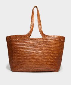 Dragon Diffusion x Todd Snyder Woven Leather Shopper Tote in Warm Cognac Rectangular Natural Bucket Bag With Intrecciato Weave, Woven Leather Bucket Bag For Market, Natural Leather Basket Bucket Bag, Natural Leather Basket-shaped Bucket Bag, Brown Woven Leather Bucket Bag, Brown Leather Handwoven Bucket Bag, Brown Woven Leather Basket Bucket Bag, Handwoven Brown Leather Bucket Bag, Brown Leather Basket-shaped Bag