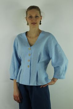 "Write the selected color in the message Handmade sky blue V neck linen blouse with front buttons and long sleeves, perfect for casual wear and suitable for any occasion in any season Details: - 100% natural linen produced in Europe ; - medium weight (180 gram per square meter); - color: sky blue, could be any from our colors catalog (color samples at the photo); Made to order, approximately a few days, If you have any questions please message me and I will be glad to answer. Size guide : Size X Blue Linen V-neck Blouse, Spring Linen Tops With Buttons, Light Blue Summer Tops With Button Cuffs, Blue Linen Blouse For Spring, Light Blue Linen Blouse For Spring, Spring Blue Linen Blouse, Light Blue Buttoned V-neck Blouse, Light Blue Tops With Button Cuffs For Daywear, Linen Button Tops For Daywear