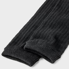 Keep cozy and stylish with the Women's Ribbed Supersoft Leg Warmer Boot Socks - Universal Thread™ 4-10. These socks offer a snug fit with a ribbed design that adds texture and warmth. The supersoft material feels great against your skin, making them ideal for chilly days. Wear them with boots or around the house for extra comfort and a touch of effortless style. Universal Thread™: Found exclusively at Target. Snug Solid Winter Socks, Snug Winter Socks, Casual Super Soft Knee-high Socks For Winter, Soft Snug Knee-high Winter Socks, Soft Snug Knee-high Socks For Winter, Comfortable Leg Warmers For Cold Weather, Super Soft Stretch Winter Socks, Comfortable Ribbed Winter Socks, Soft Comfortable Winter Leg Warmers