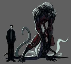 a man standing next to a giant monster