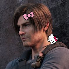 an image of a man with hello kitty ears on his head looking at the camera