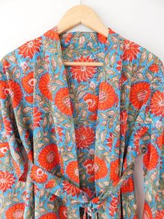 A robe and kimono is a perfect addition to your holiday wardrobe. A perfect loungewear kimono robes are comfortable for hot humid summer days. The block printing on the fabric is rich and vibrant. Colours may vary due to screen setting and lightening. Specification: Length : 47 inch Bust : Fit upto 50 inch Pockets : Yes With belt. For any other information please drop me a message. Cotton Dressing Gown, Kimono Floral, Beach Kimono, Boho Bridesmaid, Printed Robe, Kimono Fabric, Cotton Kimono, Boho Kimono, Print Kimonos