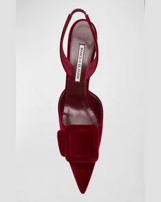 "Find MANOLO BLAHNIK Maysli Velvet Buckle Slingback Pumps on Editorialist. Manolo Blahnik \"Maysli\" velvet slingback pumps featuring a pointed toe, decorative buckle detail, elasticated slingback strap, and stiletto mid heel. 2.75 in / 70 mm stiletto heel Pointed toe Stretch halter slingback Leather outsole Lining: Leather Fits true to size; we recommend ordering your normal size. Made in Italy" Luxury Slingback Pumps For Party With Buckle Closure, Luxury Party Slingback Pumps With Buckle, Luxury Party Slingback Pumps With Buckle Closure, Red Slingback Pumps With Buckle For Party, Red Slingback Pumps With Buckle Closure For Party, Designer Slingback Pumps With Buckle Closure For Party, Designer Slingback Pumps For Party With Buckle Closure, Elegant Red Slingback Pumps With Buckle, Elegant Red Slingback Pumps With Buckle Closure