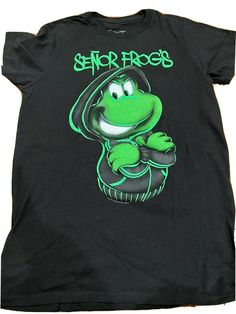 SENOR FROG'S BOYS T-SHIRT TOP SIZE XL 12 COLOR BLACK IN GOOD USED CONDITION SMOKE FREE AND PET FREE SERIOUS BIDDERS ONLY PLEASE!!!!  PLEASE ASK ANY & ALL QUESTIONS BEFORE PLACING BID(S). PLEASE ASK IF IT IS NOT IN THE LISTING DESCRIPTION & IT IS IMPORTANT TO YOU. SALES ARE FINAL!!! SO ASK ANY & ALL QUESTIONS AHEAD OF TIME. I DO NOT ACCEPT RETURNS UNLESS ITEM HAS BEEN GROSSLY MISREPRESENTED. PAYMENT IS DUE 3 DAYS AFTER AUCTION HAS ENDED. NON PAYING BIDDERS WILL BE REPORTED AND ITEM WILL BE RE-LIS Green Cotton Band Merch Top, Streetwear Green Shirt With Front Print, Green Streetwear Shirt With Front Print, Green Shirt With Front Print For Streetwear, Green Front Print Shirt For Streetwear, 90s Style Green Shirt For Streetwear, Boys T Shirts, Frogs, Shirt Top