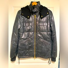 Awesome Leather Jacket In The Excellent Condition. No Rips Or Stains. Comes From A Smoke Free Pet Free Home. Sleeves Are Purposely Distressed. Size 50 And Fits Like A Large. Gold Hardware Designer Hooded Outerwear For Streetwear, Designer Leather Jacket For Winter Streetwear, Luxury Outerwear With Pockets For Streetwear, Luxury Streetwear Outerwear With Pockets, Designer Hooded Outerwear For Cold Weather, Designer Winter Outerwear With Double-lined Hood, Designer Double-lined Hooded Outerwear For Winter, Designer Fitted Outdoor Outerwear, Designer Fitted Outerwear For Outdoor