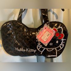 Hello Kitty Bow Bag.It Is 16x9. New With Tags. Cute Black Satchel Bag, Retro Black Shoulder Bag For School, Cute Black Rectangular Shoulder Bag, Retro Black Bag With Zipper Closure, Cute Black Shoulder Bag For Party, Trendy Black Shoulder Bag With Cat Design, Black Cat Design Shoulder Bag For School, Trendy Hello Kitty Shoulder Bag, Black Shoulder Bag With Cat Design For Daily Use