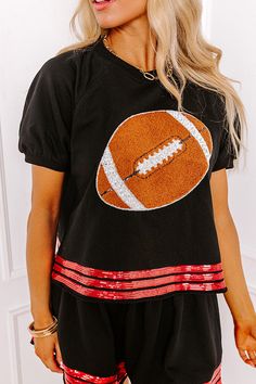 - Be ready for touchdowns and tailgates with this sparkling top! Its super cute sequined football design and jersey-style accent stripes are perfect for bringing a bit of glam to game day. Put a trendy twist on sporty style with this adorable piece! Show your team spirit with our vibrant clothing collection inspired by the bold colors of popular college football teams like the Arkansas Razorbacks, Arkansas State Red Wolves, Texas A&M Aggies, Texas Tech Red Raiders, and the University of Georgia Vibrant Clothing, Red Wolves, College Football Teams, Arkansas State, Texas Tech Red Raiders, Red Raiders, Football Teams, Crew Cut, Jersey Style