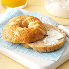 a bagel sitting on top of a blue napkin