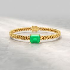 Indulge in the opulence of our 5 Carat Emerald Cut Lab-Grown Emerald Cuban Chain Bracelet. Handcrafted to perfection, this luxurious bracelet features a bold Cuban chain adorned with a mesmerizing lab-grown emerald, meticulously cut into an elegant emerald shape. The radiant gemstone exudes an unparalleled brilliance, capturing the captivating allure of natural emeralds. Perfect for marking special occasions, this exquisite bracelet serves as a timeless keepsake or a thoughtful personalized gift Luxurious Bracelet, Gold Cuban Chain, Cuban Chain Bracelet, Stacked Wedding Rings, Luxury Bracelet, Custom Bracelet, Band Bracelet, Engagement Rings Oval, Cuban Chain