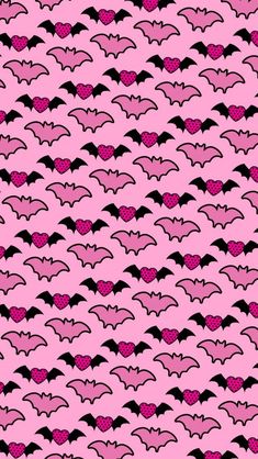 a pink and black bat pattern with hearts on it's backgroung