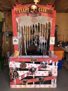 an old carnival machine with decorations on it