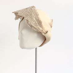 This rare and incredibly intricate 1920's cream felt cloche hat, embellished with real sea fan branches, which have been delicately painted in a soft cream coloured paint, is a magnificent piece to have in your collection. The rounded domed crown, showcases a structural side swirl along left hand side, in which the stems of the sea fans are delicate sewn in, concealing the stitches perfectly. The slim turned down brim and curved edges along the front of the hat, frame the face in true 1920's fas Cream Brimmed Cloche Hat For Evening, Cream Cloche Hat For Evening, Cream Brimmed Evening Costume Hats And Headpieces, Cream Brimmed Costume Hats For Evening, Cream Brimmed Costume Hats And Headpieces For Evening, Cream Brimmed Evening Costume Headpieces, Cream Brimmed Evening Costume Hat, Fitted Beige Cloche Hat, Elegant Adjustable Cream Bonnet