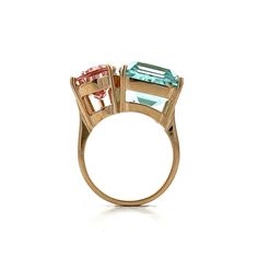 This unique By Filigree creation is a modern Toi et Moi ring, featuring a striking combination of an emerald cut aquamarine and a pear cut morganite. Both gemstones are prong set on a 2.4 mm flat edge band made of high polished 14k yellow gold. The aquamarine measures 14.67 x 12.06 x 8.50 mm and weighs 11.84 carats, while the morganite measures 13.15 x 8.97 x 5.25 mm and weighs 3.98 carats. Sized at 6.5, this statement ring is perfect for adding a bold touch to any outfit and is ideal for anytime you need a little extra! Platinum Rose Gold, Sapphire Solitaire, Shop Engagement Rings, Morganite, Mens Wedding Bands, Wedding Men, Aquamarine, Pave Diamonds, Shop Necklaces