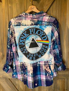 Artfully distressed, upcycled and sustainable flannel shirt paired with upcycled tee with graphic. This flannel is a women's in style but sourced from a variety of brands so resized for a roomy fit.  All one of kind and unless noted, flannel is medium weight.  Show your love with a unique piece that only you will have. Spring Grunge Shirt With Relaxed Fit, Trendy Relaxed Fit Flannel Shirt, Upcycle Band Shirts, Cotton Top For Fall Festival, Grunge Cotton Tops Pre-washed, Cotton Grunge Shirt For Spring, Grunge Pre-washed Cotton Top, Grunge Style Pre-washed Cotton Top, Spring Cotton Grunge Shirt