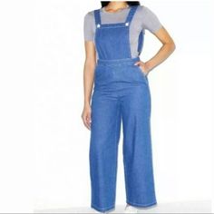 Brand New With Tags....Never Worn. Questions? Leave A Comment Below! Blue Utility Overalls With Straight Leg, Blue Utility Straight Leg Overalls, Blue Straight Leg Utility Overalls, Blue Utility Denim Jumpsuit With Straight Leg, Utility Blue Denim Jumpsuit For Spring, Blue Utility Denim Jumpsuit For Spring, Blue Utility Overall Jeans, Blue Straight Leg Utility Denim Jumpsuit, Blue High Rise Utility Denim Jumpsuit