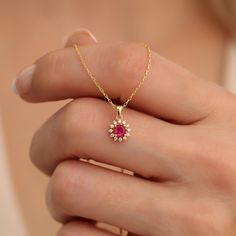 Ruby becomes a light in the darkness of the individual. It supports the connection of the energy field with the earth for the renewal of energy stores. Ruby is the birthstone of July. F E A T U R E S * Made to Order. * Gold KT: 14K * Choice of Gold Color: Yellow Gold, Rose Gold, White Gold * Gem Stone: Genuine Diamond * Diamond-Cut: Round * Diamond Carat: 0.07ct. * Ruby Carat: 0.30ct. * Pendant Height: 7.20 mm / 0.28 inch * Pendant Width:  7.20 mm / 0.28 inch * Diamond Color-Clarity: G.VS Color, A Light In The Darkness, Ruby Diamond Necklace, Gold Ruby Necklace, خواتم خطوبة, Neck Pieces Jewelry, Lucky Jewelry, Diamond Necklace Designs, Diamond Pendants, Gold Pendant Jewelry