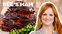 a woman standing next to a pile of ribs with the words reese's ham on it