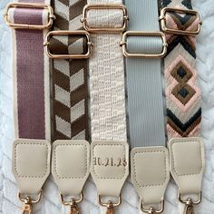 These straps can be used as a Popular Tumbler Crossbody Strap, Removable Mix and Match Bag Strap, Travel Accessory, Custom Engraved Boho Shoulder Strap, For Everyday Outing. Looking for a different or unique strap for your tumbler sleeve/pouch? Want to stand out from the crowd with an engraved strap? Or just looking for another strap for your crossbody purse? These straps are for you!  *Stanley tumbler and sleeve/pouch not included HOW TO ORDER: ------------------------------------------ 1) Choose between purple/cream, light pink/black, brown/tan, gray, or cream strap with leather. Along with engraving or no engraving. *Please note that strap colors may appear differently in person versus the computer or cell phone screen.  2) If engraving on leather, choose font from drop down box (we can Gray Purse, Custom Strap, Travel Carrier, Stanley Tumbler, Engraved Initials, Phone Screen, Crossbody Purse, Bag Straps, Crossbody Strap