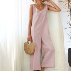 Light Pink Tie Strap Pocket Sleeveless Jumpsuit, Wide Leg, V Neck Color: Pink Material: 65% Polyester 35% Cotton Fit: True To Size Sleeveless Cotton Jumpsuits And Rompers In Solid Color, Beach Sleeveless Solid Color Jumpsuits And Rompers, Sleeveless Solid Color Jumpsuit For Summer, Summer Sleeveless Cotton Jumpsuits And Rompers, Sleeveless Solid Color Summer Jumpsuits And Rompers, Summer Sleeveless Jumpsuits And Rompers With Pockets, Sleeveless Summer Jumpsuits And Rompers With Pockets, Casual Sleeveless Jumpsuits And Rompers For Vacation, Sleeveless Cotton Jumpsuit For Vacation