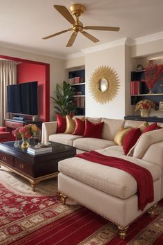 a living room filled with furniture and a ceiling fan