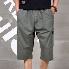 Season:Summer; Fabric:95% Cotton; Gender:Men's; Style:Sports,Casual,Stylish; Occasion:Streetwear,Outdoor,Going out,Daily; Fit Type:Regular Fit; Function:Comfort,Wearable; Waistline:Mid Waist; Pattern:Plain; Design:Elastic Waist,Multi Pocket; Pants Type:Capri Pants,Cargo Shorts,Shorts; Fly Type:Elasticity; Front page:FF; Listing Date:01/10/2023; Production mode:External procurement; Hips:; Length:; Waist:; Pants Length:Calf-Length Outdoor Streetwear, Pants Elastic Waist, Pants Cargo, Mens Cargo, Cargo Shorts Men, Shorts Cargo, Casual Stylish, Plain Design, Type Of Pants