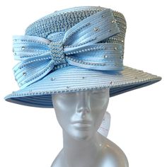 This Gorgeous Designer Couture Satin Ribbon Church, Wedding, Or Special Occasion Hat Is “Over The Top” Adorned With Rows And Rows Of Crystal Rhinestones. The Trimming Is Made Up Of A Double Satin Ribbon Bow And Covered With Loose Crystal Stones. A 4-5 Inch Square Crown And A 4-5 Inch Down-Turned Brim. Available In: Turquoise, Orange, Lt. Blue, And Fuschia. An Adjustable Sweatband Inside The Crown To Fit Most Head Sizes Fitted Light Blue Hat For Summer, Fitted Light Blue Hat For Royal Ascot, Light Blue Fitted Hat For Royal Ascot, Fitted Light Blue Hat With Curved Brim, Light Blue Fitted Hat With Curved Brim, Blue Fitted Hat For Party, Light Blue Fitted Hat For Weddings, Blue Wedding Hat For Spring, Blue Spring Wedding Hat