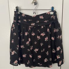 Brand: New York & Company Size: Xl Color: Black With Pink Floral Print Condition: New With Tags Feminine Black Skirt For Spring, Spring Short Gathered Skirt, Spring Black Skort With Gathered Skirt, Spring Black Skirt With Elastic Waistband, Black Skort With Gathered Skirt For Spring, Black Gathered Mini Skirt For Spring, Black Gathered Skort For Spring, Black Skater Skirts, Grey Mini Skirt