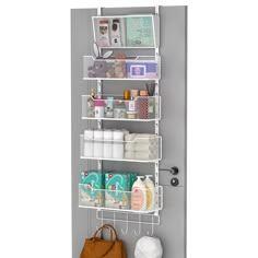 an over the door storage rack holds items and other personal care products, including a purse