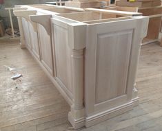 an unfinished kitchen island in the process of being built