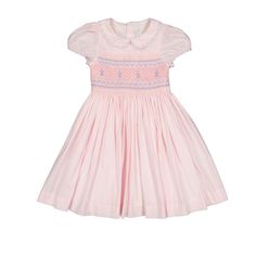 SIZE GUIDE : If you are hesitating between two sizes, we recommend going up one size (3M : newborn to 3 months ; 6M : 3 to 6 months ; 12M : 6 to 12 months ...) On a sunlit morning in the gardens of a Parisian château, the Princess Charlotte Heirloom Pink Smocked Dress feels as timeless as its surroundings. This iconic smocked dress, inspired by the refined elegance of French craftsmanship, has been lovingly handmade with short balloon sleeves and a delicate Peter Pan collar. Adorned with intrica Antoinette Dress, French Pink, 1st Communion, Sleepwear Dress, Spring Weddings, Paris Dresses, Easter Activities, Princess Charlotte, Smocked Dress