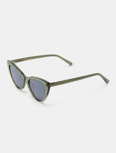 Introducing Amy Forest, a timeless fusion of classic design and contemporary elegance, meticulously crafted from eco-acetate, making a bold statement in fashion and sustainability. The perennial cat-eye silhouette gets a fresh twist with olive crystal acetate, adding sophistication to any occasion, be it brunch, beach days, or stylish soirées. Handcrafted with eco-conscious precision, these lightweight shades embody classic charm while reflecting our commitment to sustainability. Designed to fit every face shape seamlessly, Amy Forest features smoke blue lenses that combine style and substance, ensuring reliable sun protection with exceptional clarity. Embrace the versatile classic design that suits any occasion, elevating your style with the eco-friendly craftsmanship of Amy Forest, ideal Green Classic Acetate Sunglasses, Spring Acetate Sunglasses, Elegant Green Cat Eye Sunglasses With Uv Protection, Elegant Green Sunglasses With Uv Protection, Elegant Cat Eye Sunglasses For Summer, Chic Green Sunglasses For Spring, Elegant Green Cat Eye Sunglasses, Elegant Green Sunglasses For Spring, Green Cat Eye Sunglasses For Spring