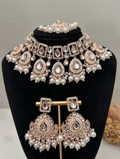 rose gold polish pearl uncut kundan choker set with tikka x earrings.  lightweight earrings  Style tip- ----------- Pair it with any beautiful traditional outfits  and flaunt with Unique style of collection from us. Perfect match for Festival and Traditional wear.  Take Care Tips-  ---------------- Kee away from perfume, Hair spray and. Moisture.  Store in dry place , Ziplock bag or Airtight box.    Clean with dry cloth.  Jewellery is the last thing you should wear and first thing you should rem Festive Rose Gold Bridal Necklace, Festive Rose Gold Bridal Necklace For Wedding, Rose Gold Choker For Wedding, Rose Gold Wedding Choker Jewelry, Traditional Rose Gold Jewelry Sets For Wedding, Rose Gold Chandbali Jewelry For Wedding, Rose Gold Chandbali Wedding Jewelry, Festive Rose Gold Chandbali Jewelry, Rose Gold Choker